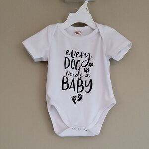 "Every Dog needs a Baby" onesie/bodysuit